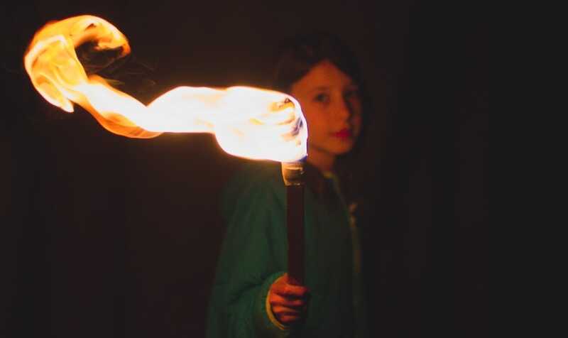 Girl holding torch